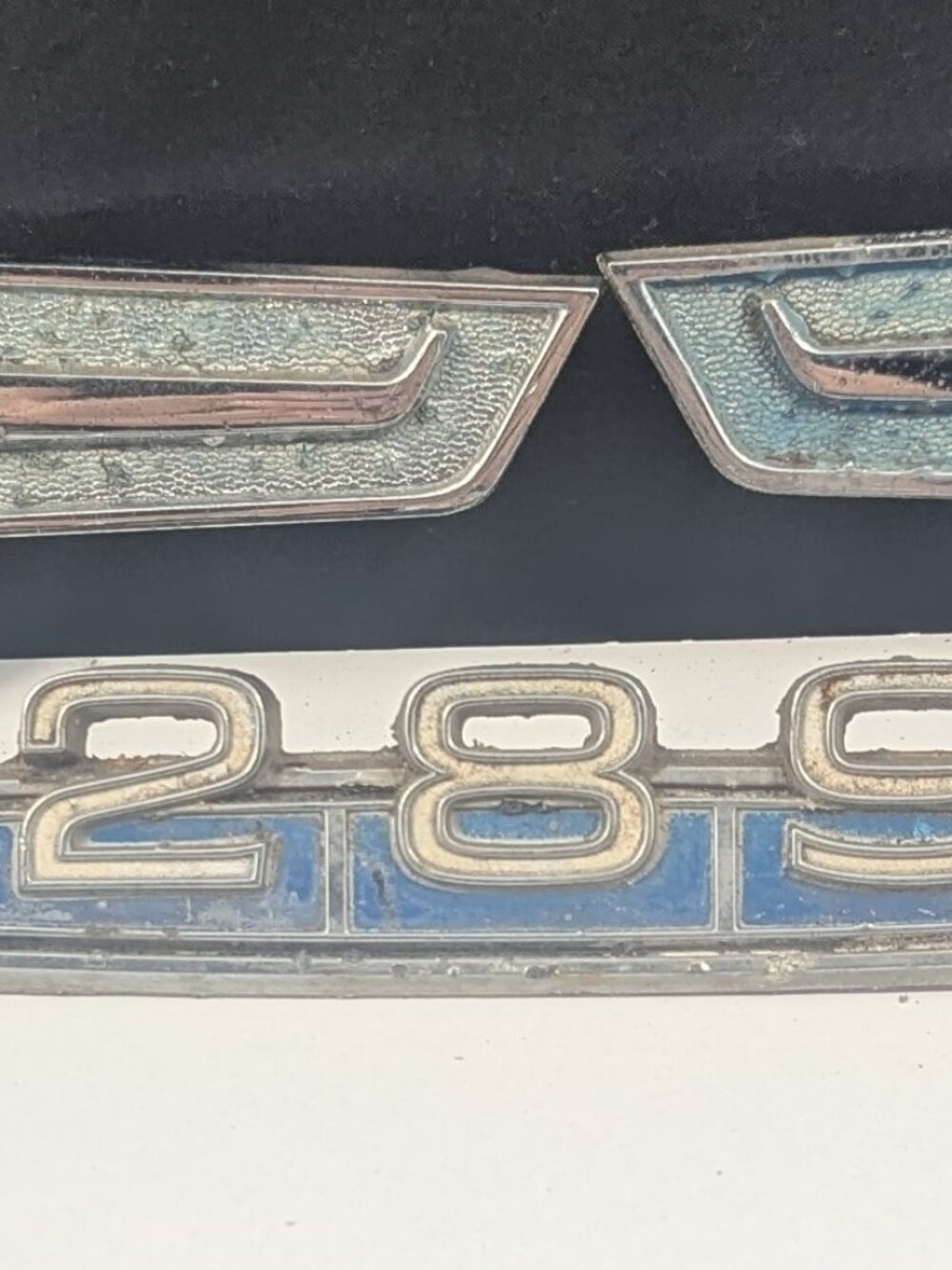 Lot of three 1960's Ford Ranchero emblems